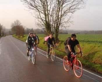 Sam and friends on a bike.