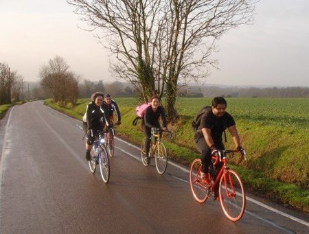 Sam and friends on a bike.