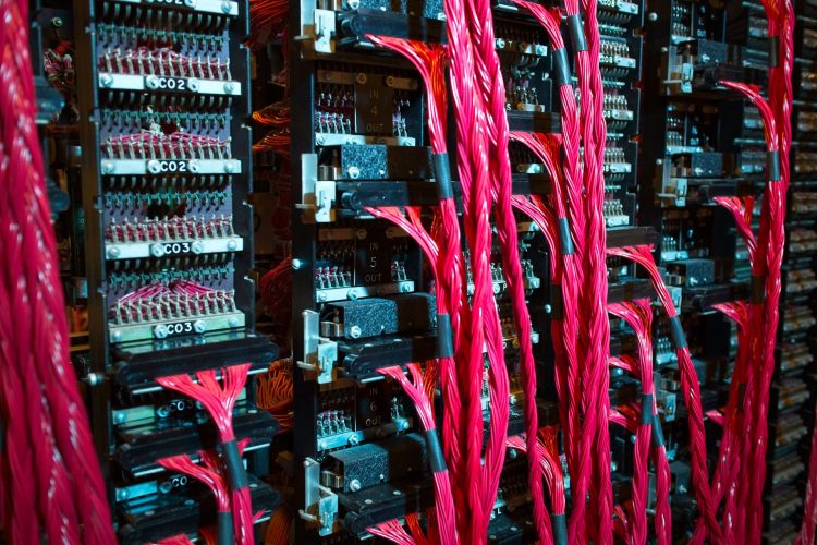 Working replica of Bombe machine in National Museum of computing just outside the fence at Bletchley Park.