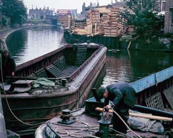 Boats turning at the Hertford Union Canal entrance having unloaded timber 1965 © London Canal Museum