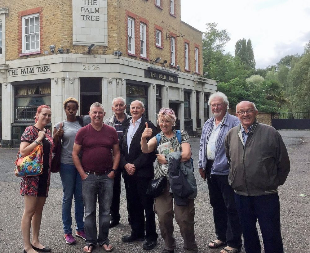 Don with fellow Geezers Ricky Ayliffe and Ray Gipson, plus various artists outside The Palm Tree for Old EastEnders project