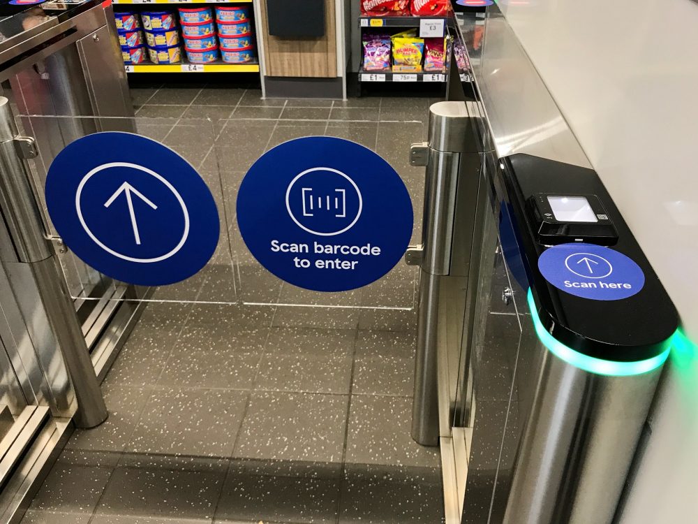 The entrance to the Tesco till-free shop near Chancery Lane tube. Scan the barcode using the Tesco app on your phone. Pick up what you'd like to buy and walk out. It works the same as Amazon Fresh.