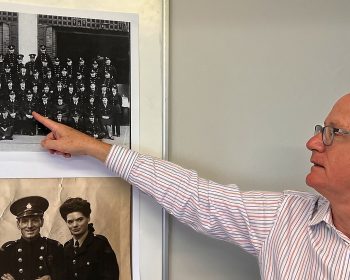 Peter Quilter pointing to his Grandfather outside Bow Fire Station in 1942