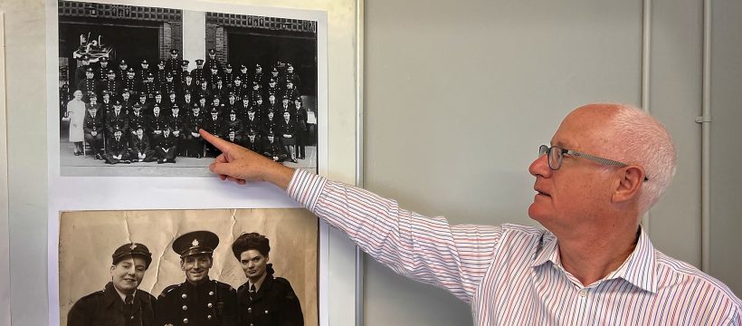 Peter Quilter pointing to his Grandfather outside Bow Fire Station in 1942