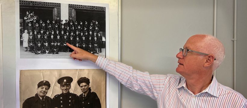 Peter Quilter pointing to his Grandfather outside Bow Fire Station in 1942