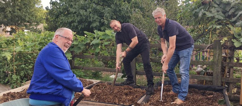 The Geezers at Stepney City Farm. Barrie Starding left, Eddie Snooks right, and Father Brian from St Barnabas Church centre