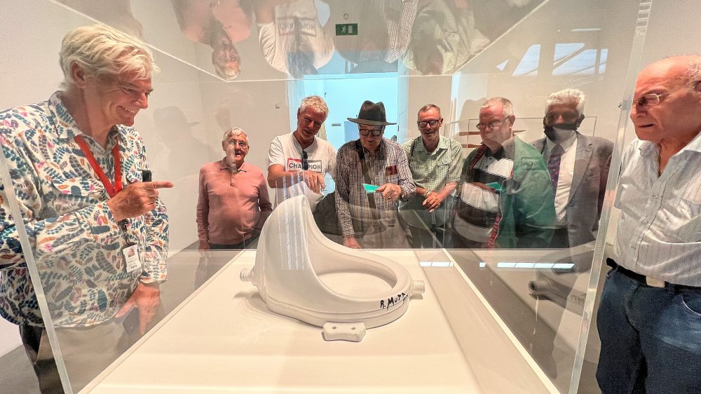 Richard Jory, left with the Geezers looking at Marcel Duchamp's famous 'readymade' - Fountain
