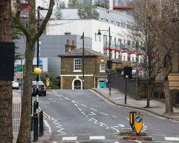 Looking east along Tredegar Road, Bow, at Pelican Cottage.