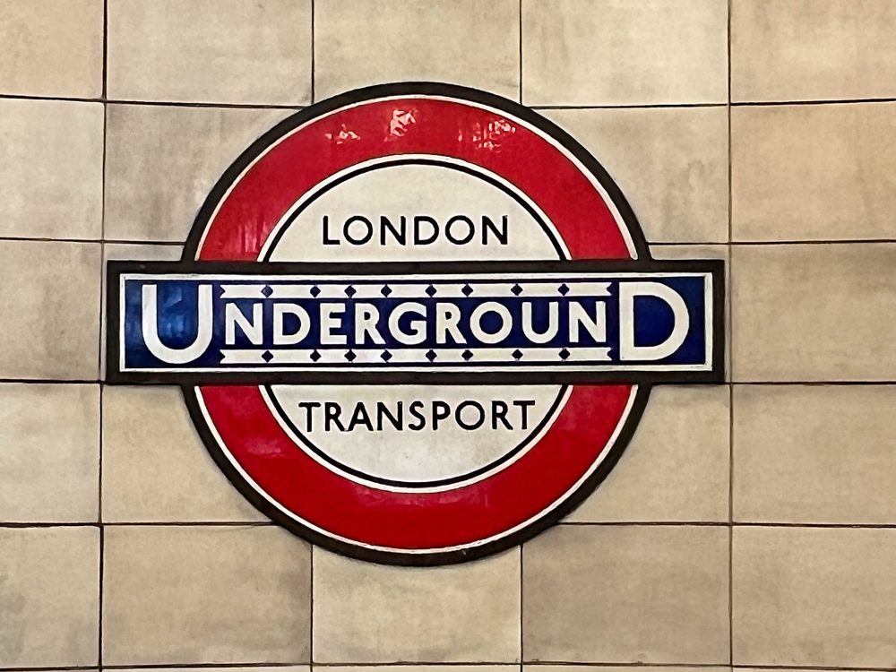 This London Transport roundel on the entrance to Aldgate East station is of a design introduced in 1933. It's right beside the art gallery.