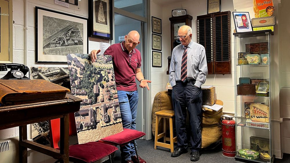 Gary Magold and Frank Turner presenting their talk in the Biscuit Museum