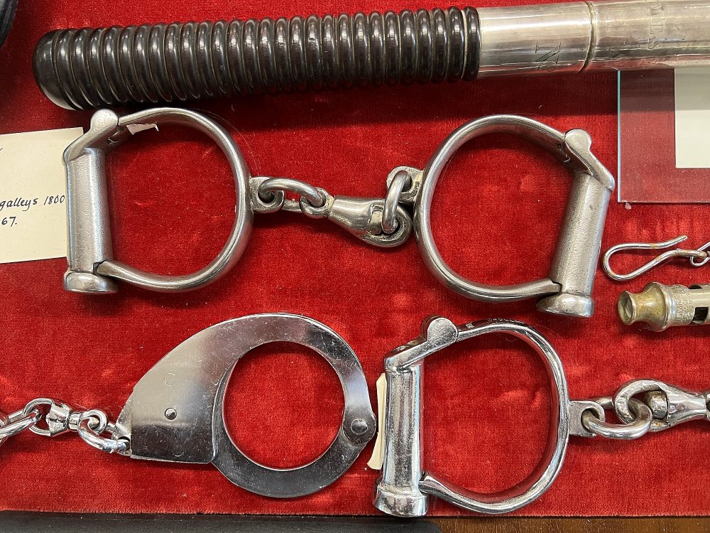 Tools of the job. The handcuffs in the middle were carried in the rowing galleys from 1800-1880s
