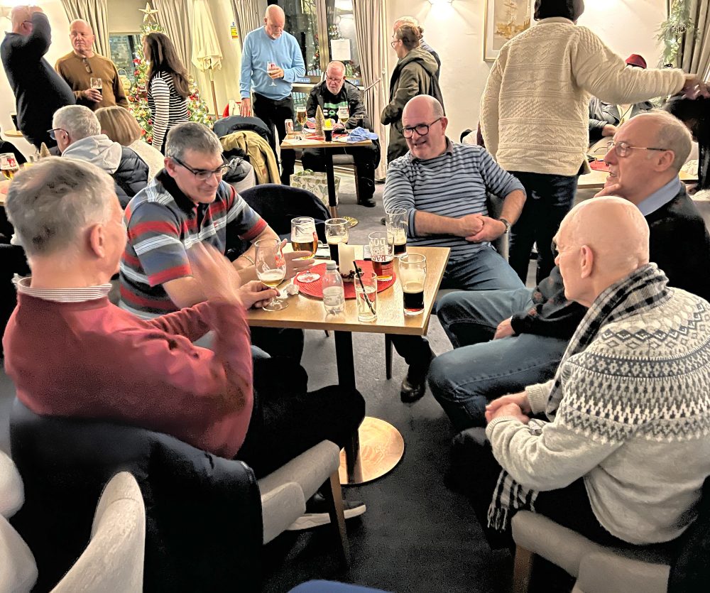 The Geezers enjoy a pint after watching Barrie's film at the Cruising Association in Limehouse Basin