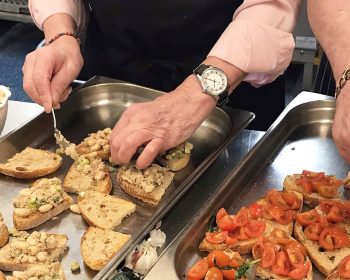 Geezers prepare bruschetta