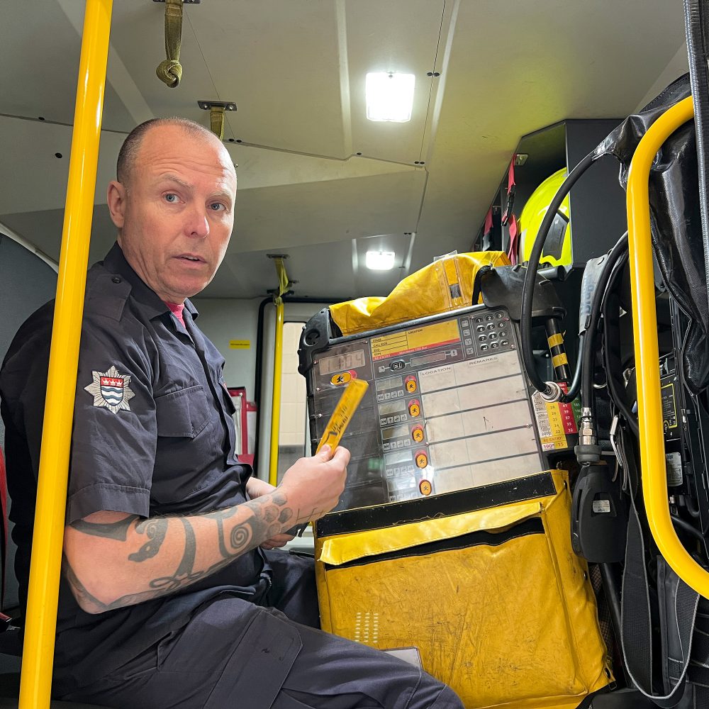 Scott Turner explaining how the the breathing apparatus board works