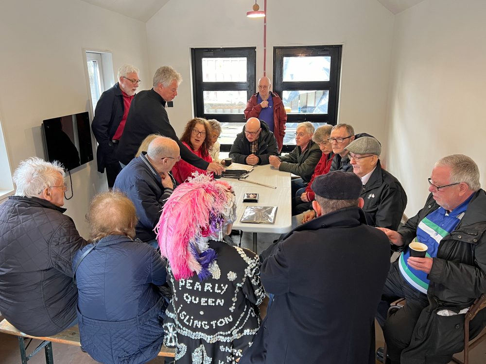The Geezers group in the newly opened Common Room with the pearly Queen of Islington