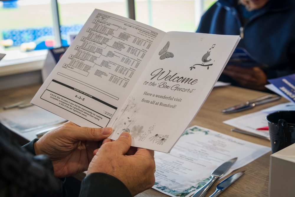 Booklet of betting odds. Leaflet saying Welcome to the 'Bow Geezers'