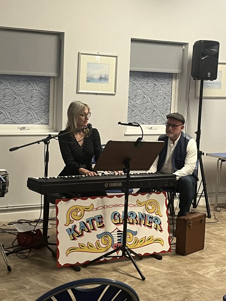Kate Garner performs at Clarion-sponsored event for the Bow Geezers & friends