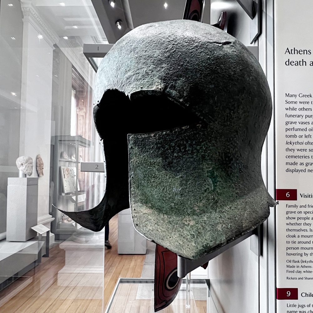 A Greek warriors helmet from 600 - 500BC. Found at Olympia, Elis. Photographed in the Fitzwilliam Museum Cambridge